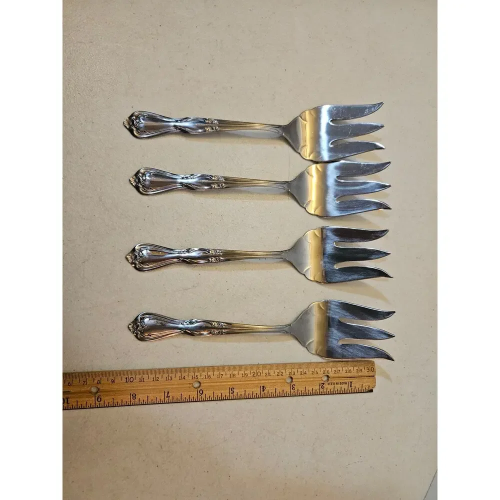 Lot of 4 stainless serving forks by International Silver Co floral flower design